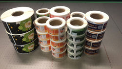 Bulk stacks of waterproof BOPP roll labels ready for shipping across Canada.